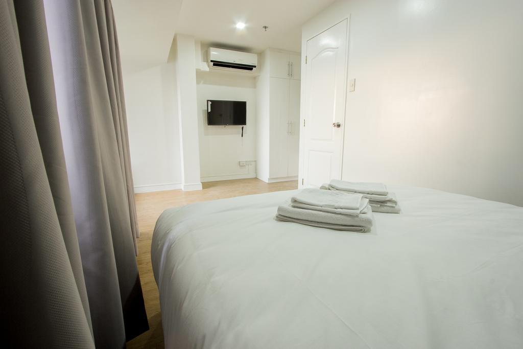 Oasis Regency @ Fort Victoria Bgc Тагиг Экстерьер фото