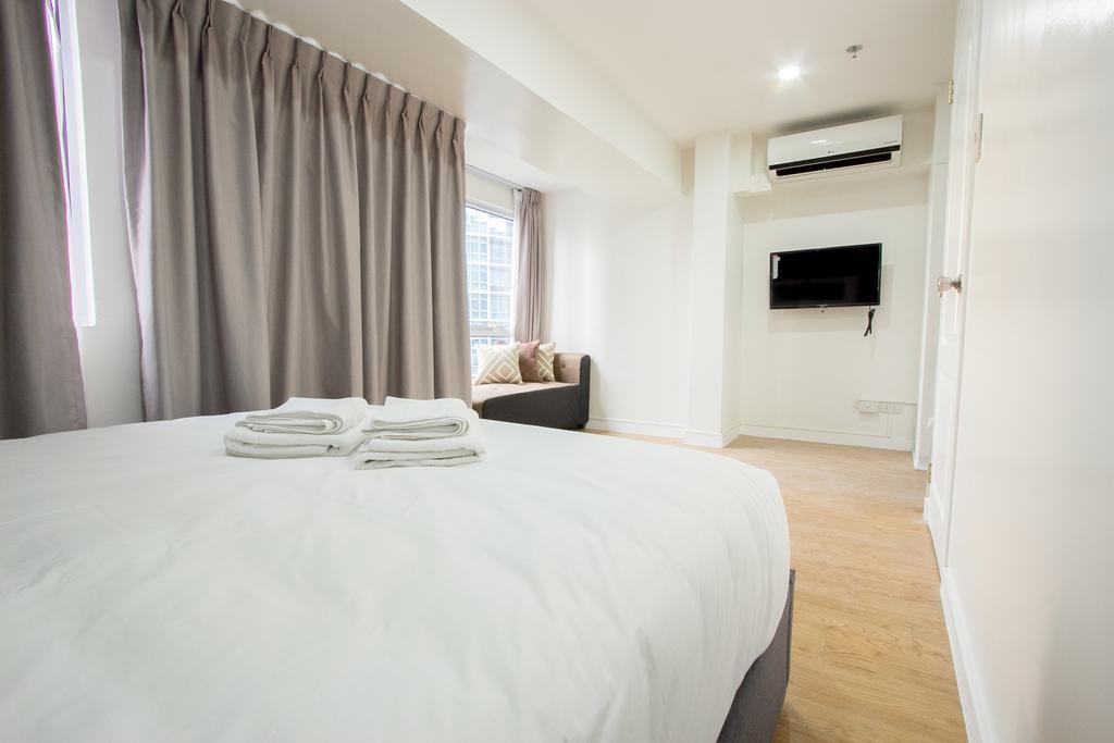 Oasis Regency @ Fort Victoria Bgc Тагиг Экстерьер фото